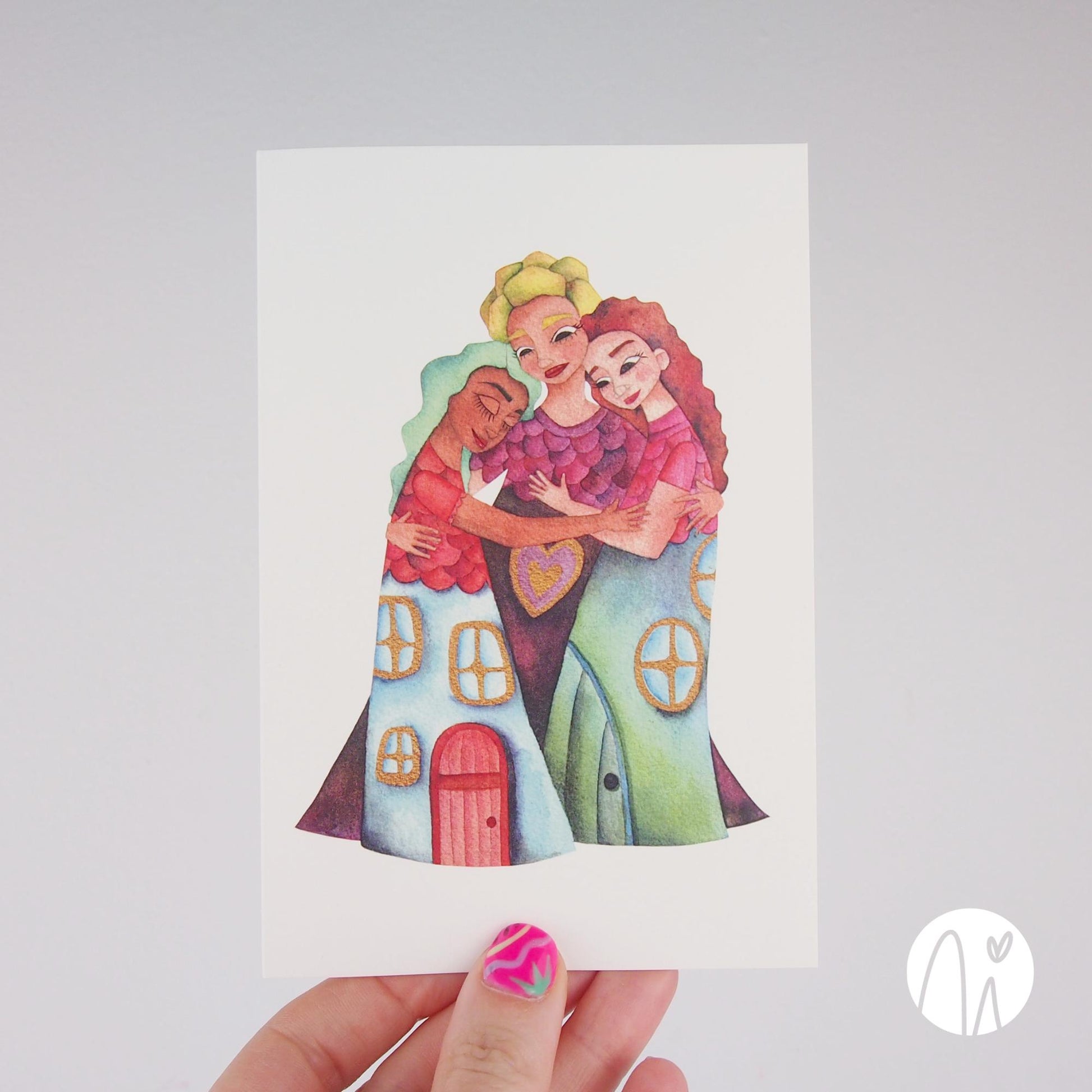 Friendship greeting card — original illustration of three women hugging, wearing house-shaped dresses that symbolize friendship as a warm and loving home, on a white background